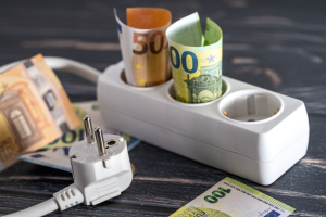 power strip and electricity plug with euro banknotes