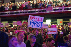 Trump supporters with a sign that reads America First