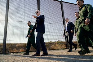 President Joe Biden walks along a stretch of the US-Mexico border in El Paso, Texas