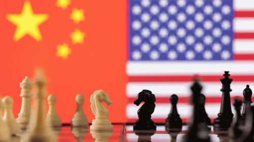 Chess pieces are shown in front of US and China flags