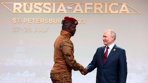 Burkina Faso's Capt. Ibrahim Traore, left, and Russian President Vladimir Putin shake hands before an official ceremony to welcome the leaders of delegations to the Russia Africa Summit in St. Petersburg, Russia.