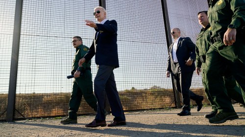 President Joe Biden walks along a stretch of the US-Mexico border in El Paso, Texas