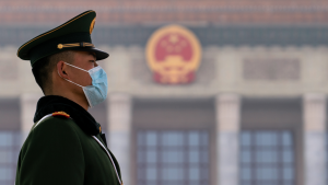 A guard outside the People Hall in Beijing. 
