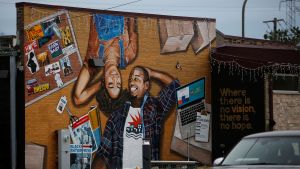 A mural is displayed on Litehouse Whole Food Grill on Dodge Avenue in the Fifth Ward, known as the historic Black community, in Evanston, Illinois