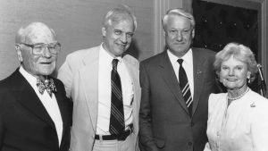 Black and white group photo of Boris Yeltsin with Council hosts. 
