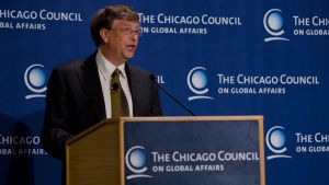 Bill Gates behind a podium at a Council event
