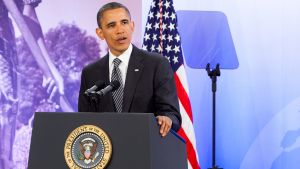 President Barack Obama stands at a podium