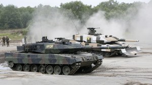 A Leopard 2A6 and a Leopard 2 PSO of the German armed forces Bundeswehr