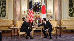 US President Joe Biden and Japan's Prime Minister Fumio Kishida shake hands