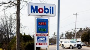a gas station sign shows high prices